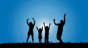 Vector silhouette of a family in a meadow.